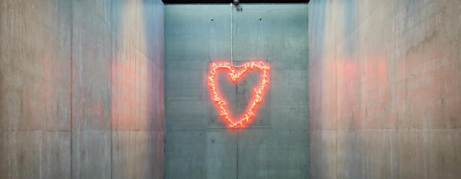 neon heart in modern architectural space