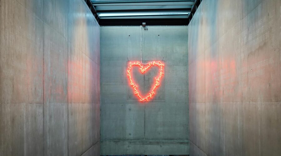 neon heart in modern architectural space